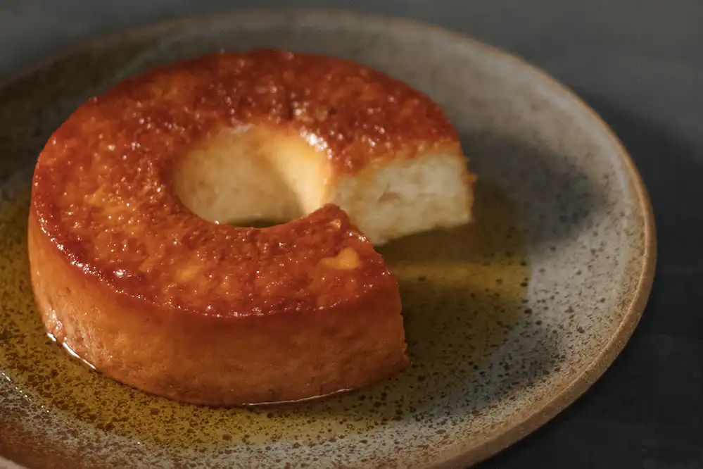 Pudim de pão com laranja